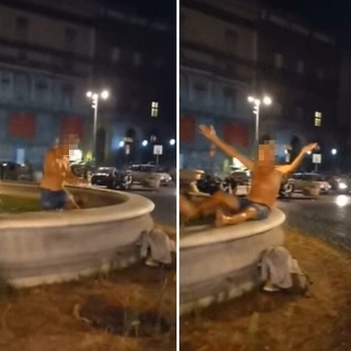 Indignazione a Napoli, turista fa il bagno nella fontana del centro: il video è virale 
